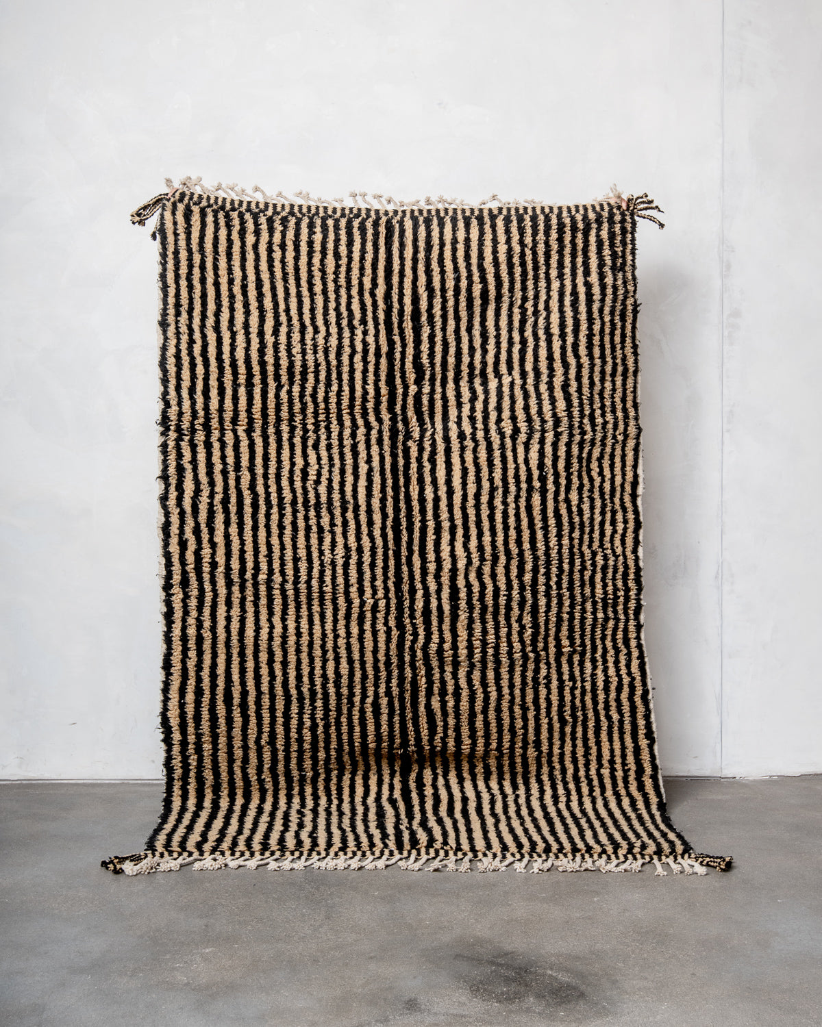Modern, designer, handcrafted Berber rug from Morocco. Beniourain carpet with beautiful colours and patterns and fluffy wool texture.